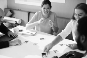 Buyer Personas - Team looking at pictures of people