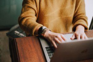 Branding - woman typing on laptop