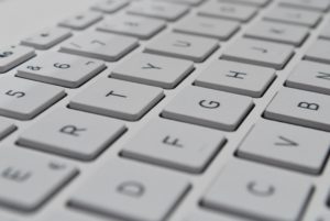 website design - apple laptop keyboard